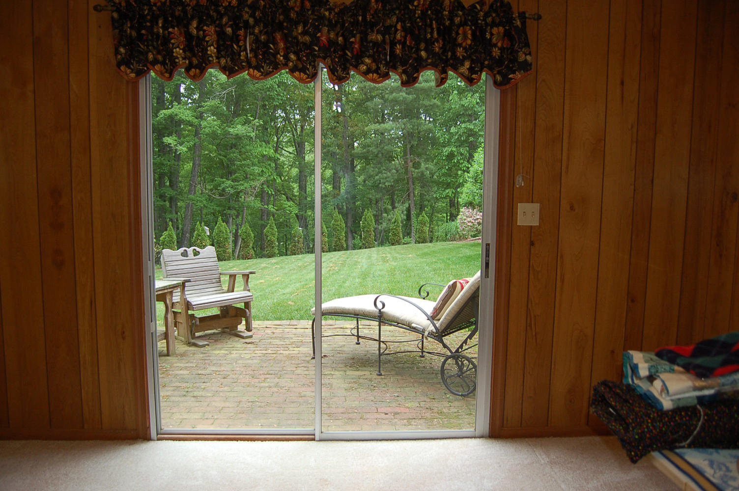 384 Pin Oak Drive Blue Ridge, VA 24064 - Photo 37 of 57 a view of a porch with chairs and backyard