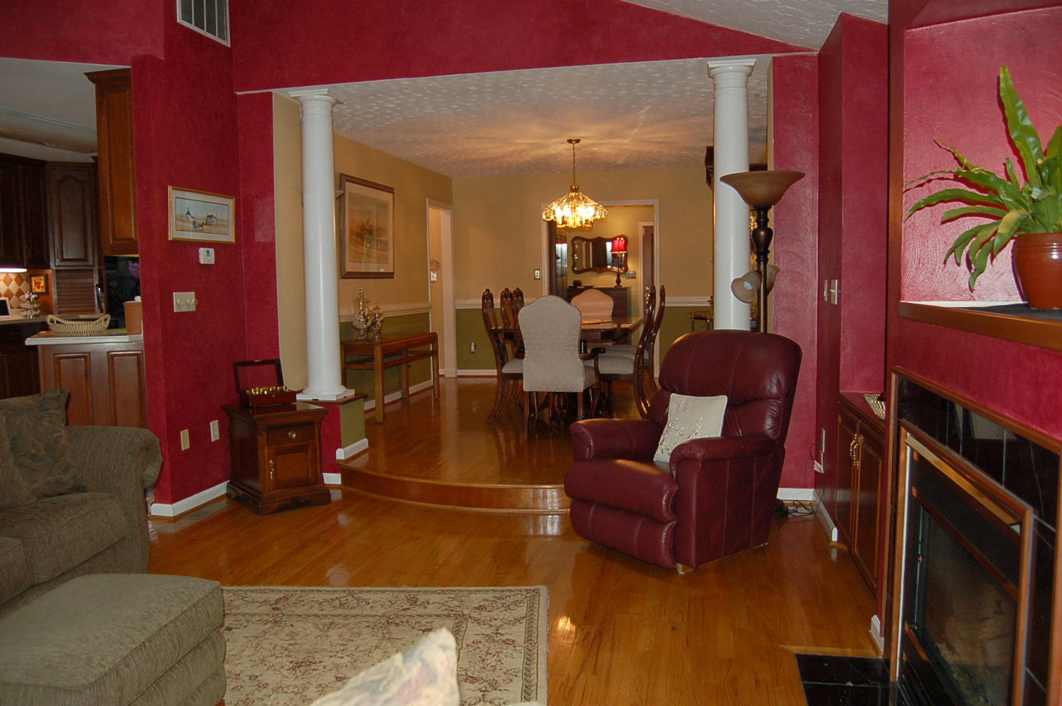 384 Pin Oak Drive Blue Ridge, VA 24064 - Photo 7 of 57 a living room with furniture a lamp wooden floor and a chandelier