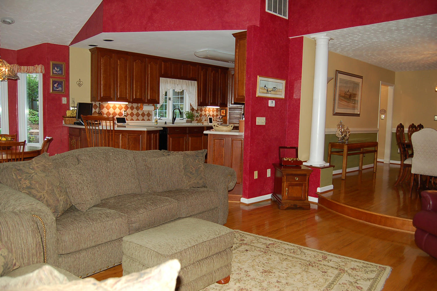 384 Pin Oak Drive Blue Ridge, VA 24064 - Photo 9 of 57 a living room with furniture gym equipment and a chandelier