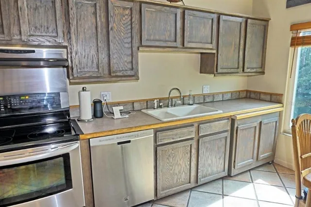 $274,900 | 1859 Mazo Manor Road, Unit U6, Lutz, FL 33558