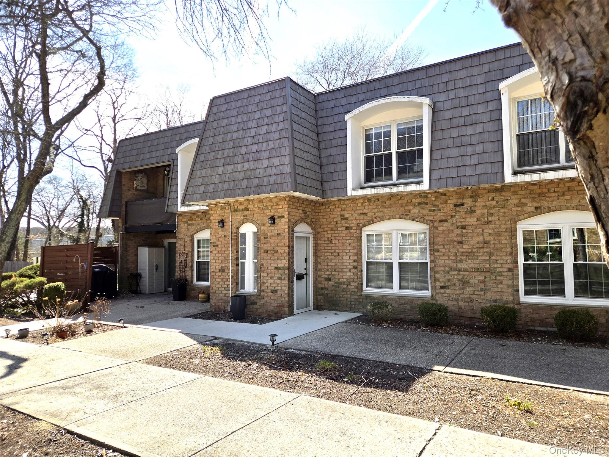 655 Middle Country Road, Unit 6A2 Coram, NY 11727 - Photo 3 of 19 Another View Of The Front Of The Coop - Nestled In A Beautiful Courtyard, Very Close To Parking & Close To All The Community Amenities.