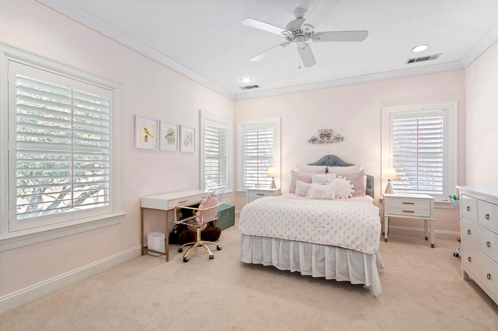 6936 Pasadena Avenue Dallas, TX 75214 - Photo 25 of 39 a bedroom with a bed and a window