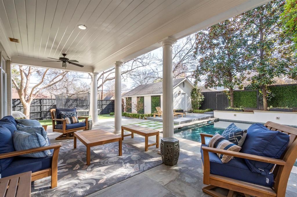 6936 Pasadena Avenue Dallas, TX 75214 - Photo 34 of 39 a outdoor living space with patio furniture and a fireplace