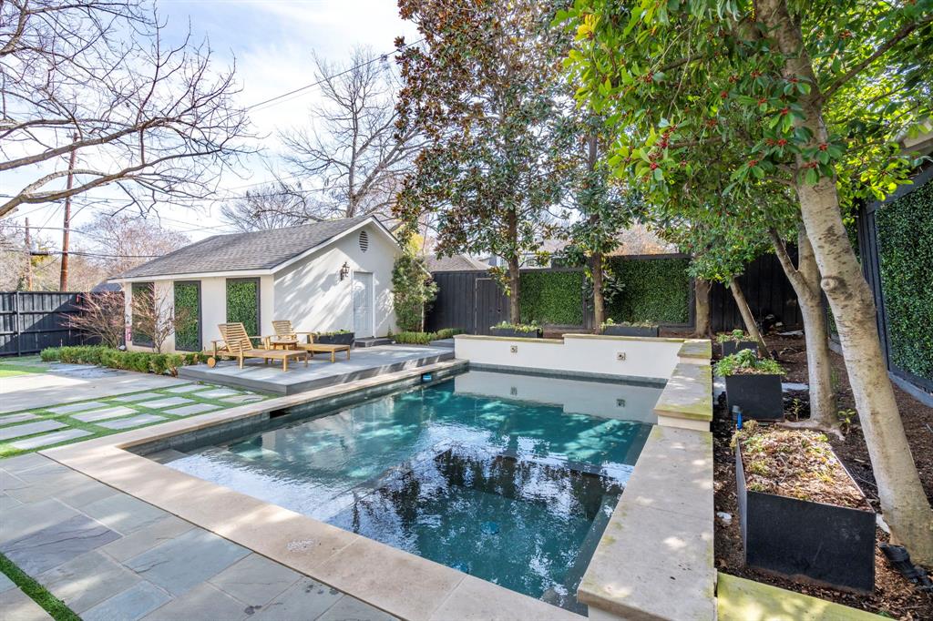 6936 Pasadena Avenue Dallas, TX 75214 - Photo 36 of 39 a view of house with patio outdoor seating and covered with trees