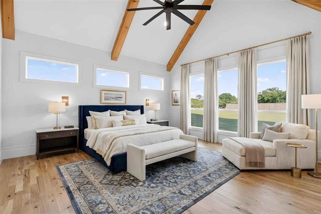7798 Barber Rnch Road Fort Worth, TX 76126 - Photo 21 of 40 a spacious bedroom with a bed and a couch