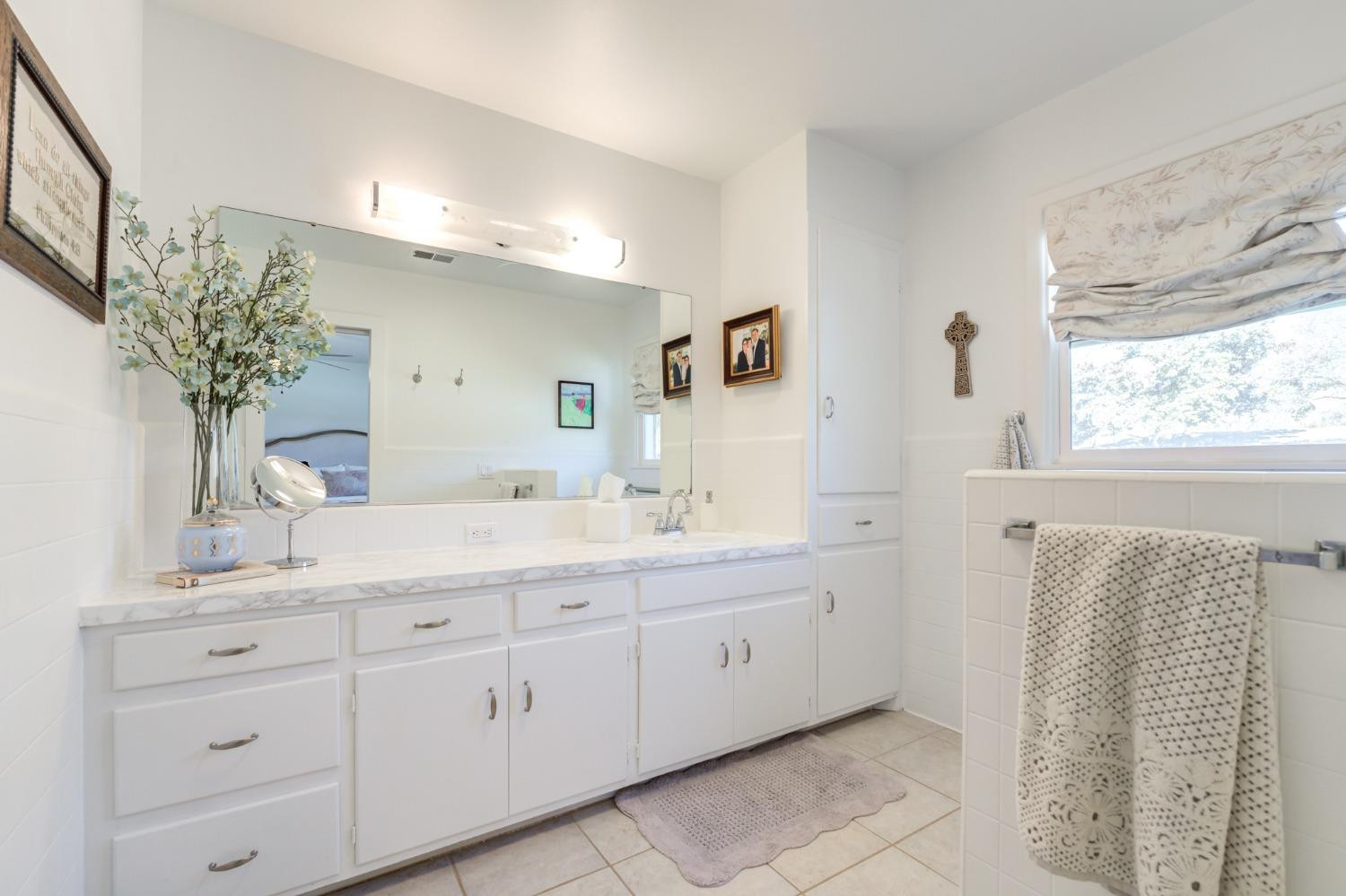 4409 14th Street Lubbock, TX 79416 - Photo 33 of 48 Large Primary Suite with Walk-in Closet.