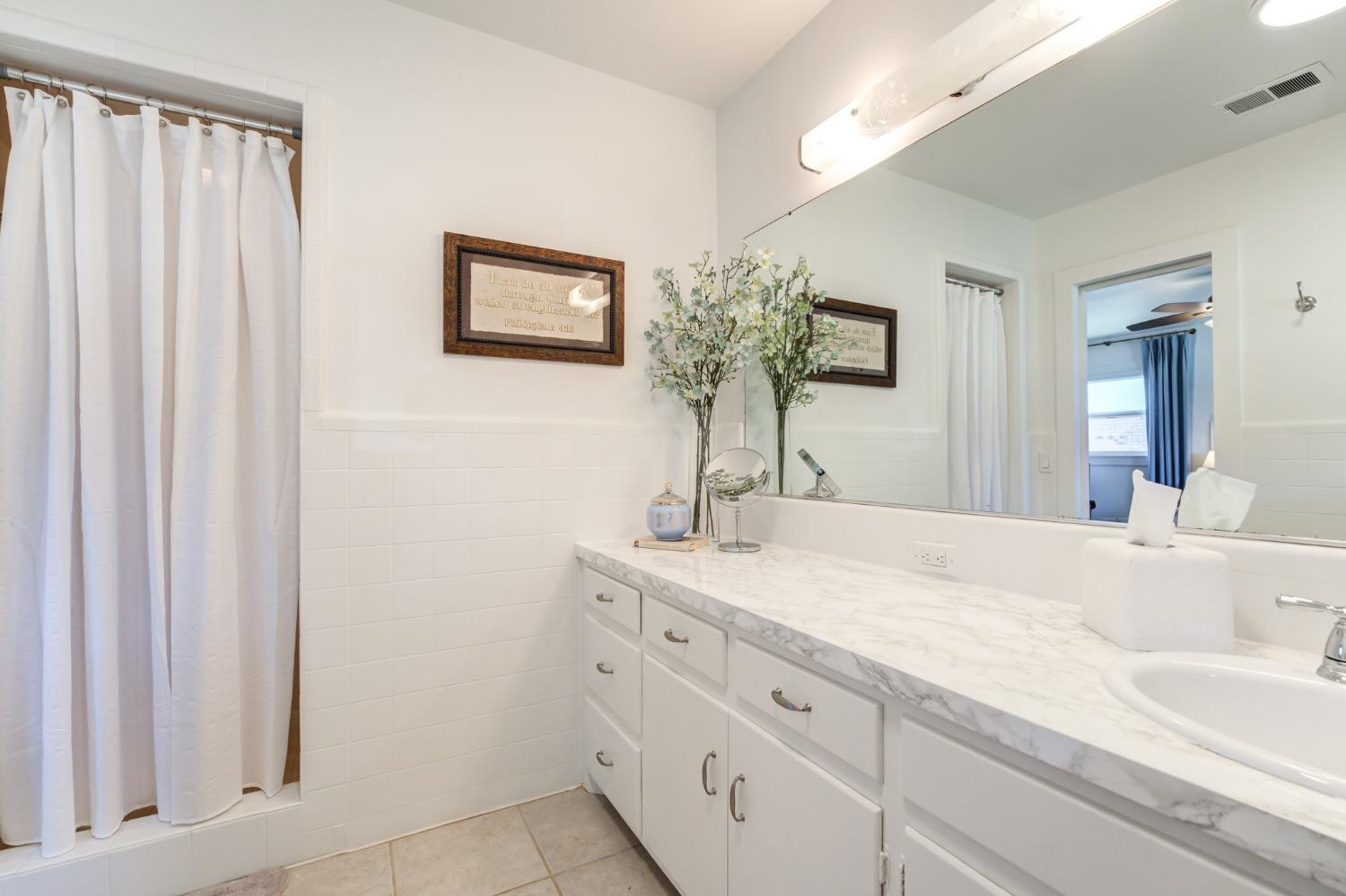 4409 14th Street Lubbock, TX 79416 - Photo 34 of 48 Primary Bath with Walk-in Shower.