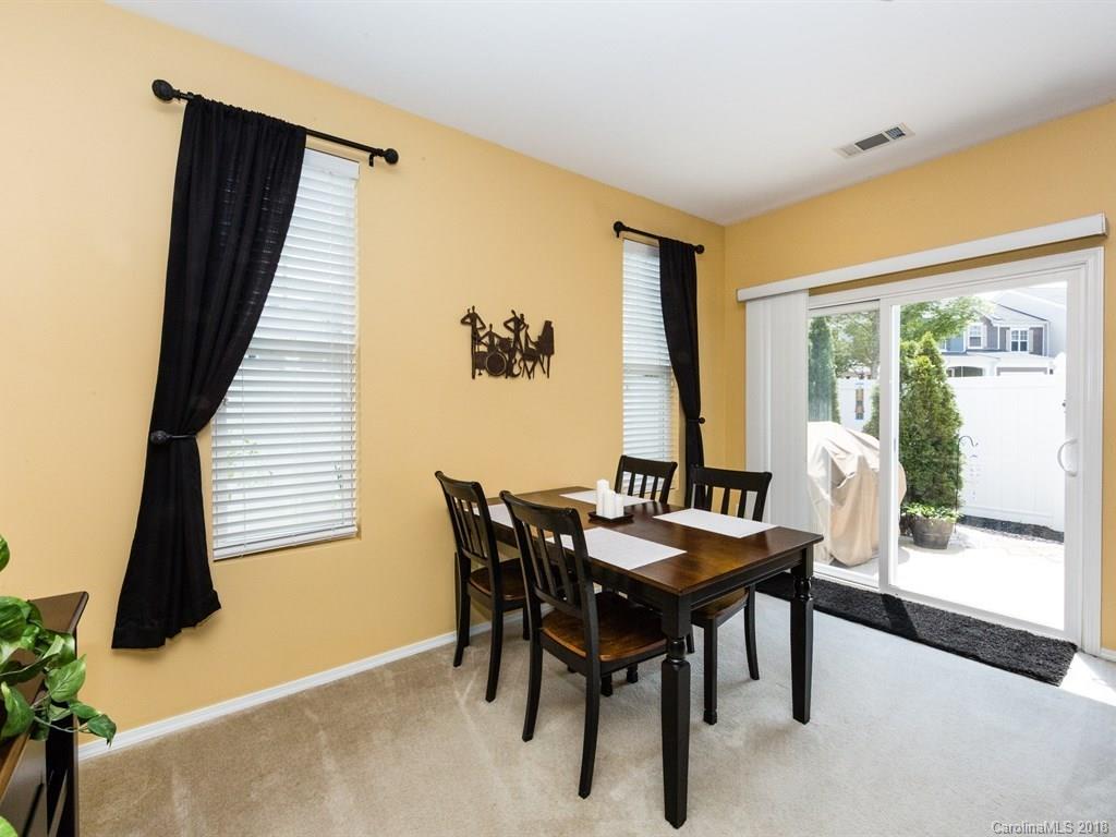 257 River Clay Road Fort Mill, SC 29708 - Photo 4 of 11 a view of a dining room with furniture and a window