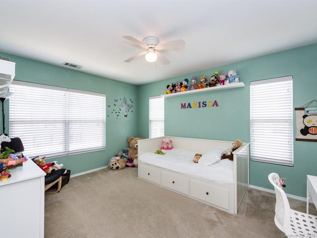 257 River Clay Road Fort Mill, SC 29708 - Photo 9 of 11 a bedroom with a bed and a window