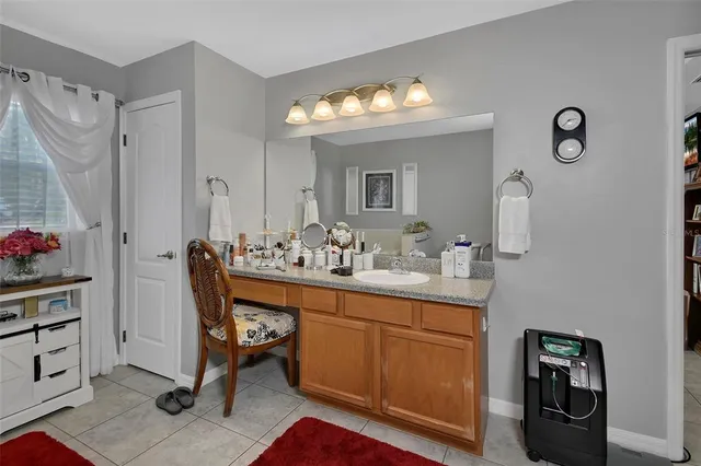 a bathroom with a sink double vanity and a mirror