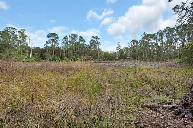 a view of mountain with lake view