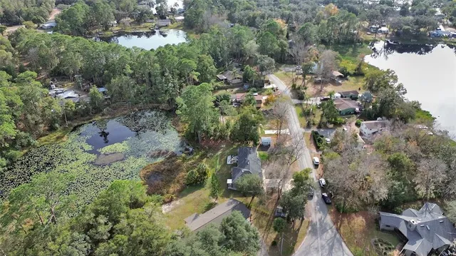 an aerial view of residential house with outdoor space