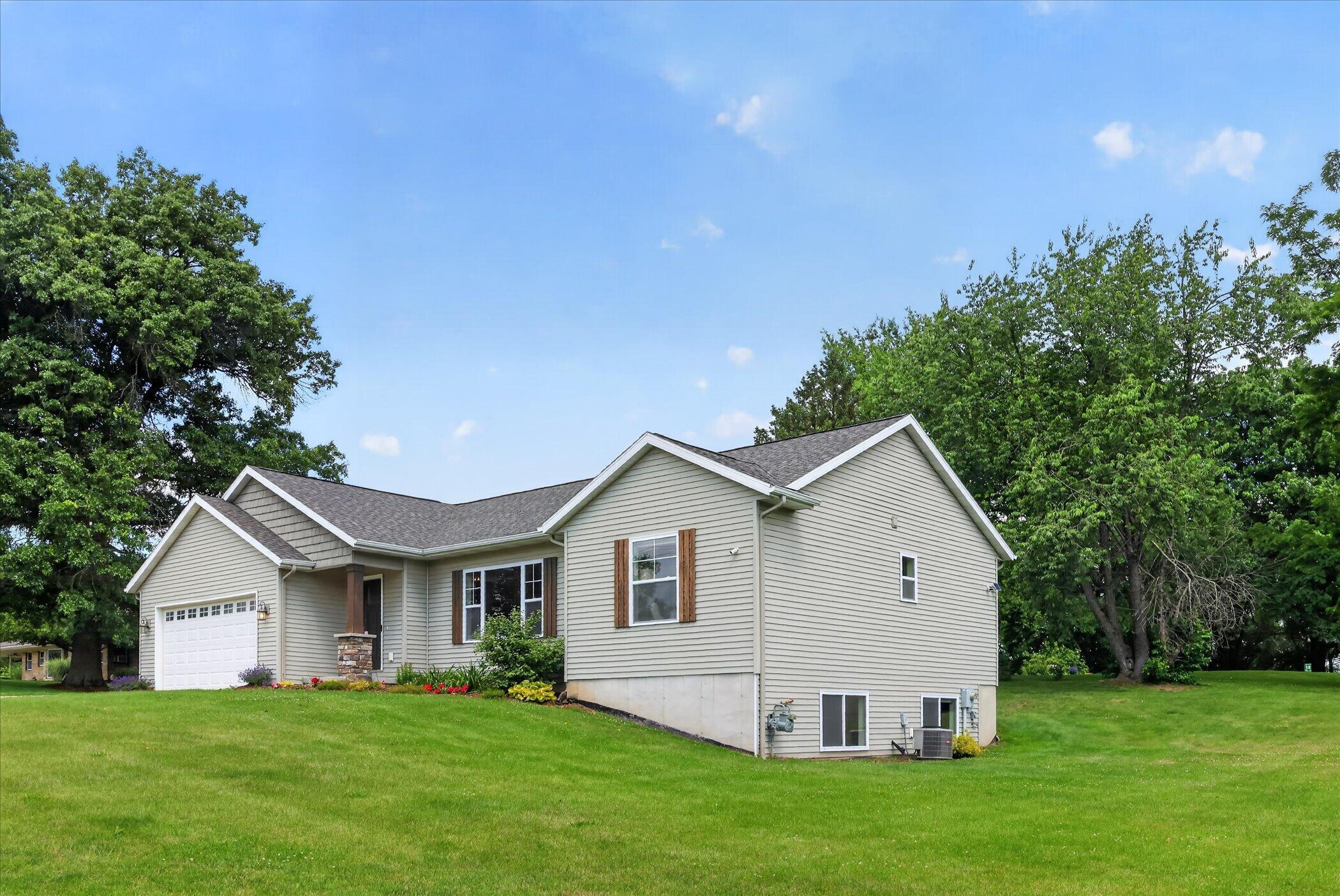 2747 4 Mile Road Northwest Grand Rapids, MI 49544 - Photo 2 of 48 Front of Home