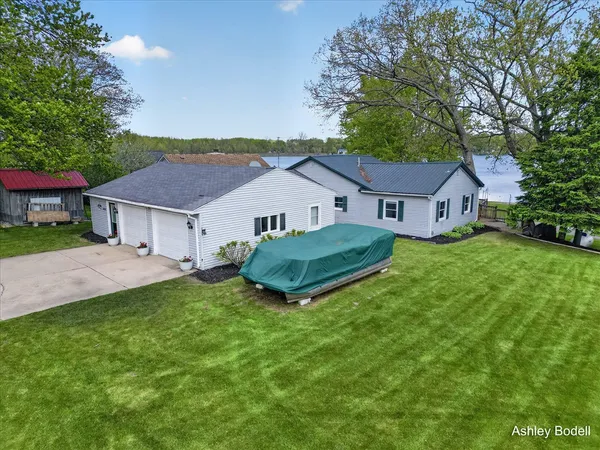 $399,900 | 3880 Bell Lake Drive Northeast, Ada, MI 49301
