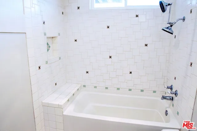 a bathroom with a bathtub