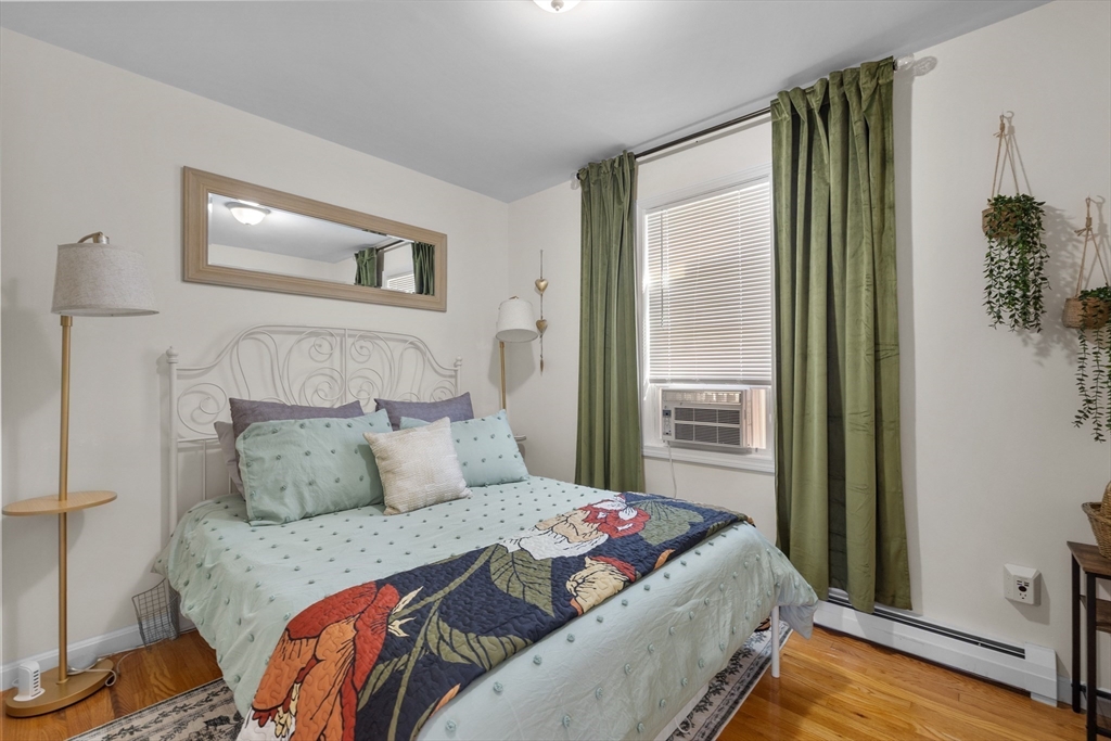 38 Brook Street Georgetown, MA 01833 - Photo 21 of 42 a bedroom with a large bed and a window