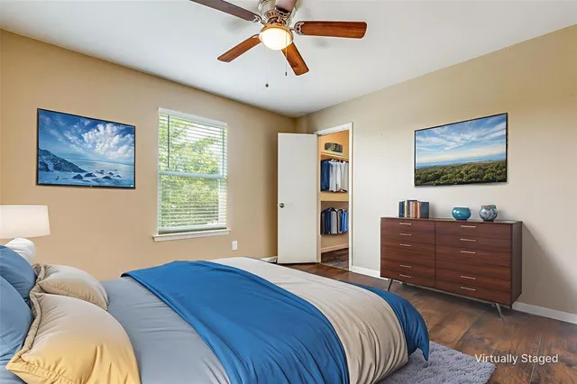 a bed room with a bed and a window