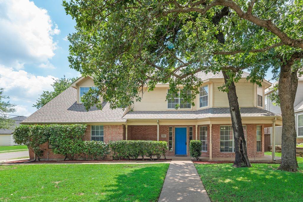 5610 Eagle Rock Road Arlington, TX 76017 - Photo 1 of 33 Traditional-style exterior featuring brick and light-colored siding