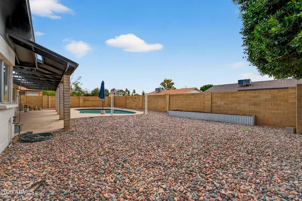 a view of a house with a patio