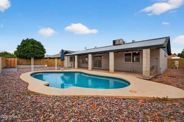 a view of a house with swimming pool