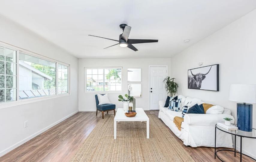 635 Paraiso Avenue Spring Valley, CA 91977 - Photo 19 of 27 a living room with furniture and a large window