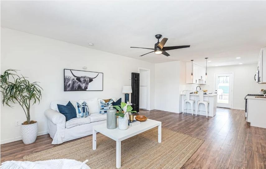 635 Paraiso Avenue Spring Valley, CA 91977 - Photo 22 of 27 a living room with furniture and a large window