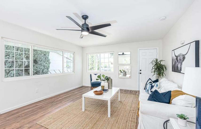 635 Paraiso Avenue Spring Valley, CA 91977 - Photo 23 of 27 a living room with furniture and a window