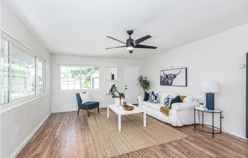 635 Paraiso Avenue Spring Valley, CA 91977 - Photo 25 of 27 a living room with furniture and a large window