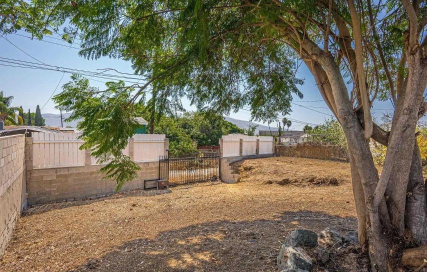 635 Paraiso Avenue Spring Valley, CA 91977 - Photo 3 of 27 a view of a yard with a tree