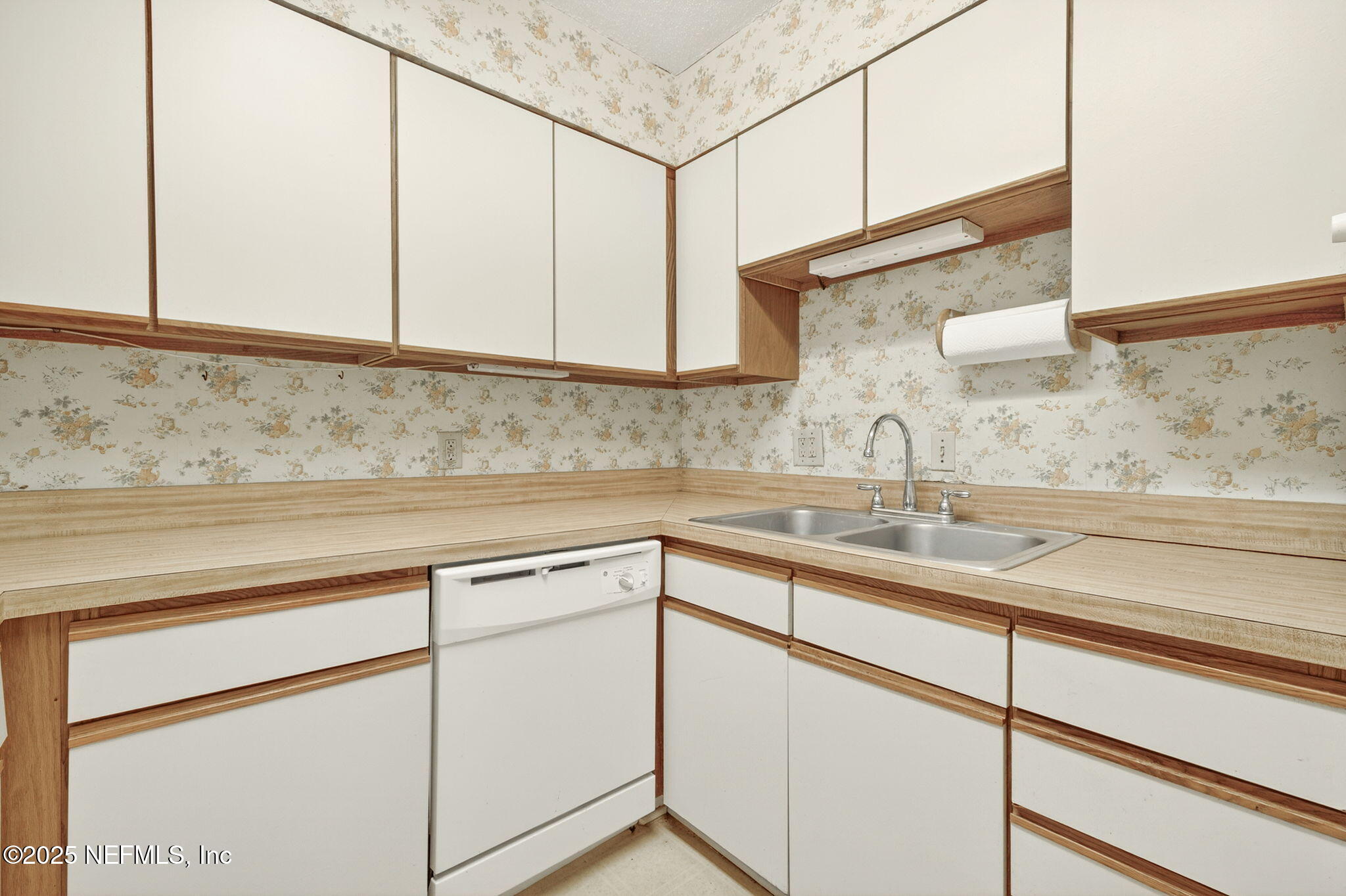 1071 Edgewood Avenue South, Unit 409 Jacksonville, FL 32205 - Photo 16 of 39 a kitchen with a sink and cabinets