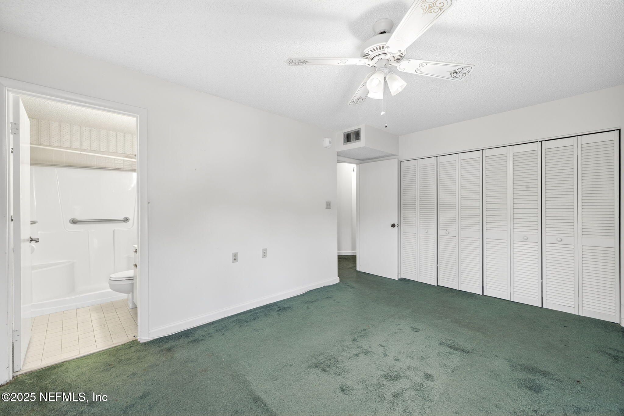 1071 Edgewood Avenue South, Unit 409 Jacksonville, FL 32205 - Photo 19 of 39 wooden floor in an empty room