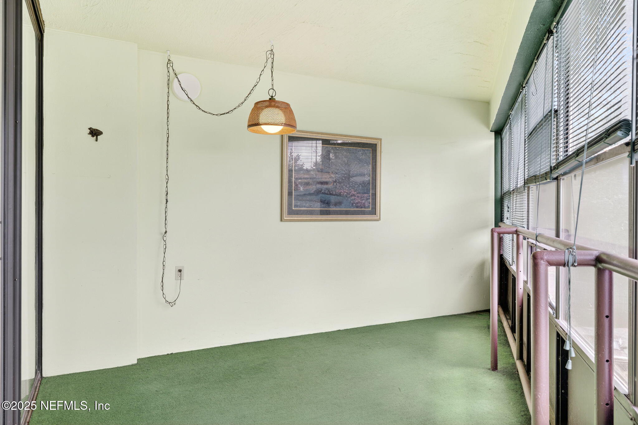 1071 Edgewood Avenue South, Unit 409 Jacksonville, FL 32205 - Photo 27 of 39 a view of a hallway with staircase