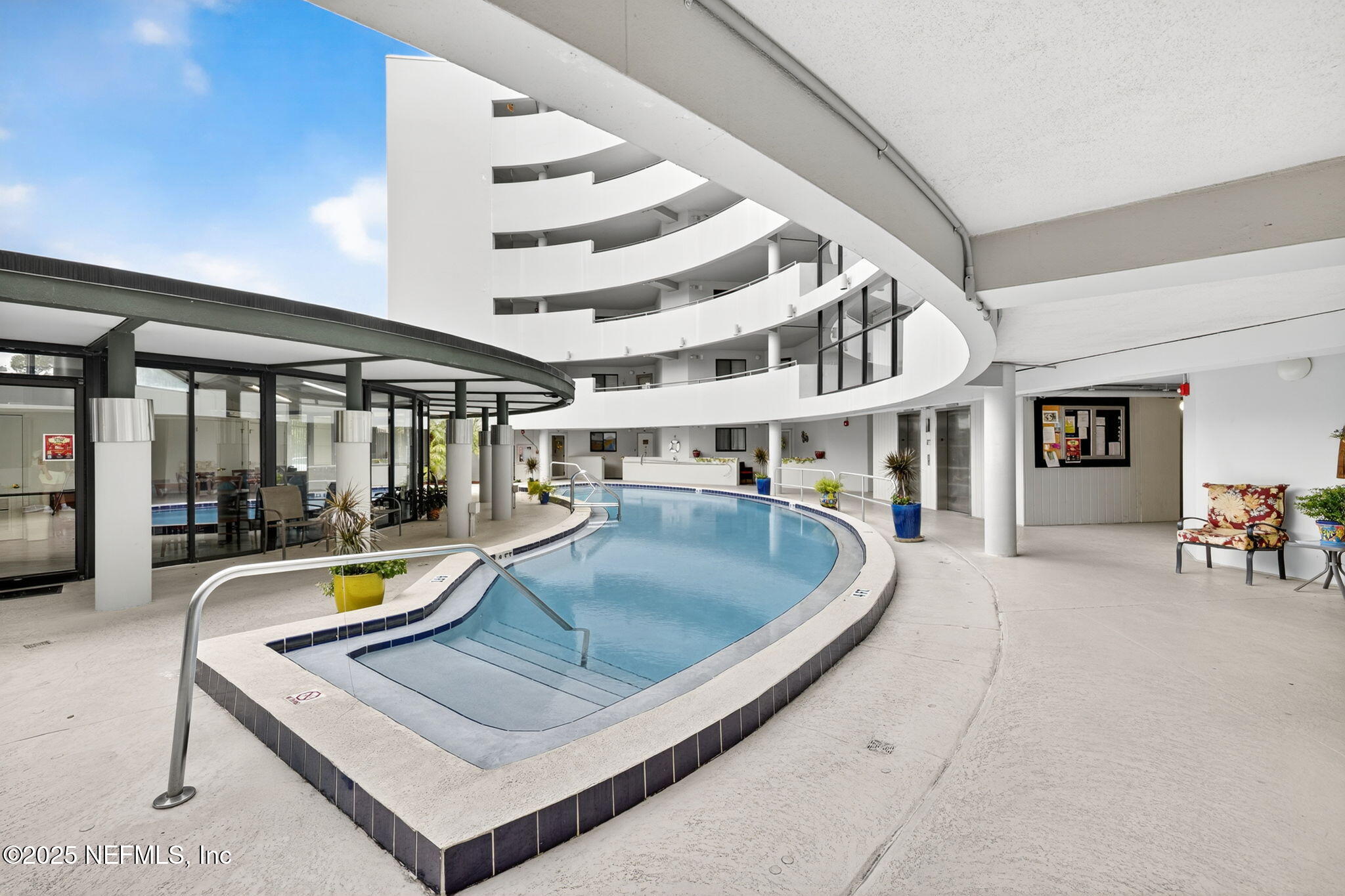 1071 Edgewood Avenue South, Unit 409 Jacksonville, FL 32205 - Photo 31 of 39 a view of swimming pool with outdoor seating and living room