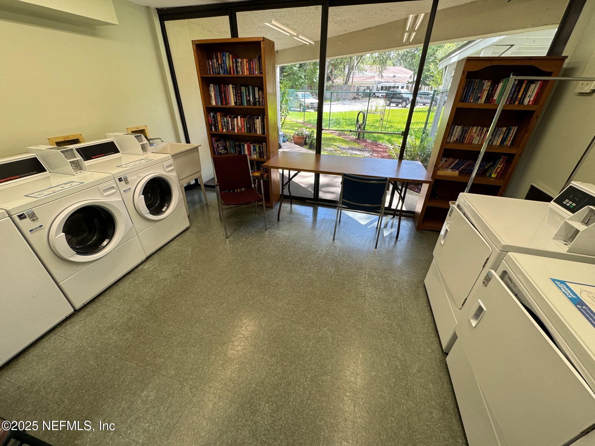 1071 Edgewood Avenue South, Unit 409 Jacksonville, FL 32205 - Photo 33 of 39 a utility room with dryer and washer