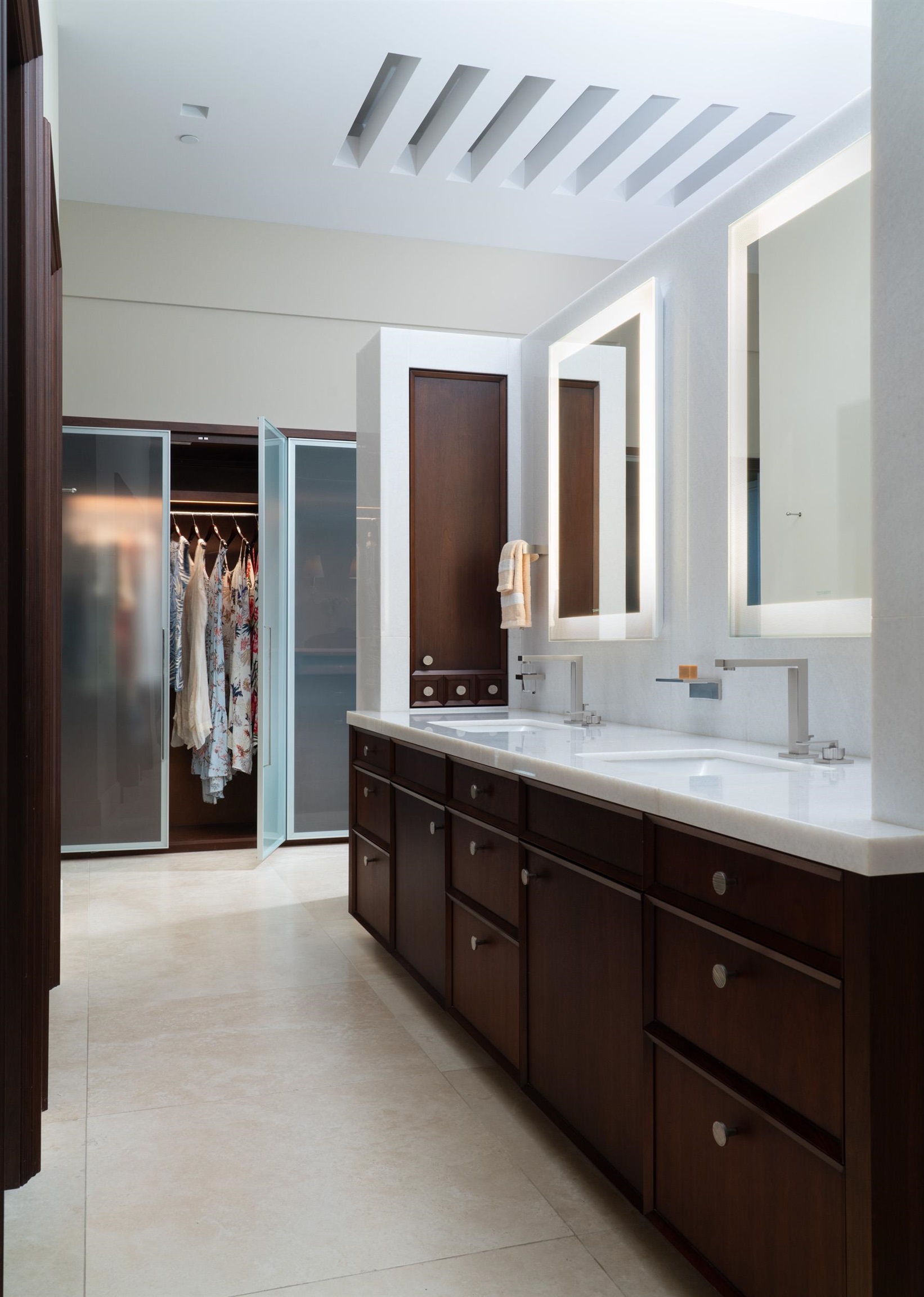 215 Plantation Club Drive Lahaina, HI 96761 - Photo 25 of 50 a bathroom with a double vanity sink and a mirror