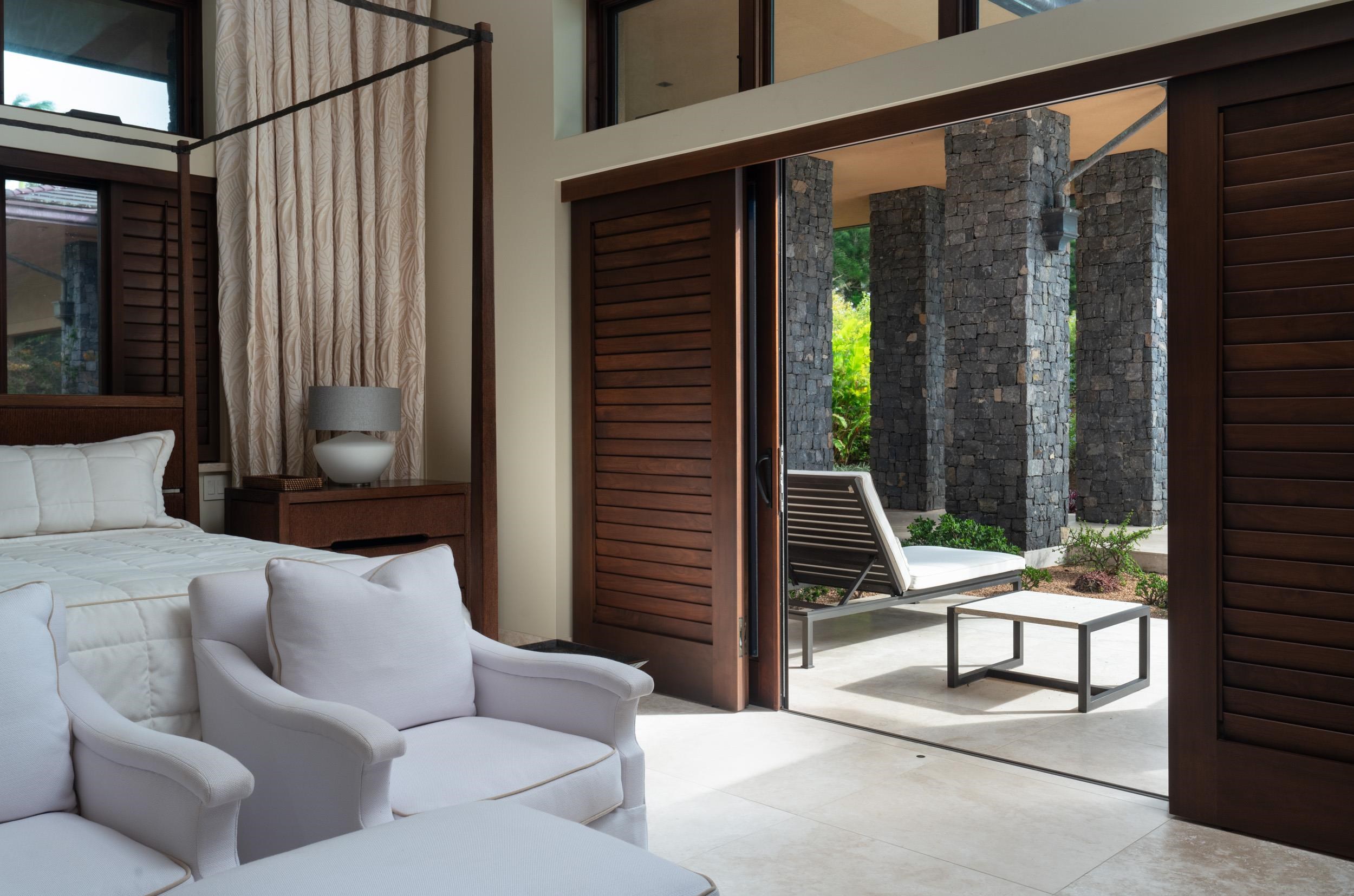 215 Plantation Club Drive Lahaina, HI 96761 - Photo 27 of 50 a outdoor living space with furniture and a potted plant