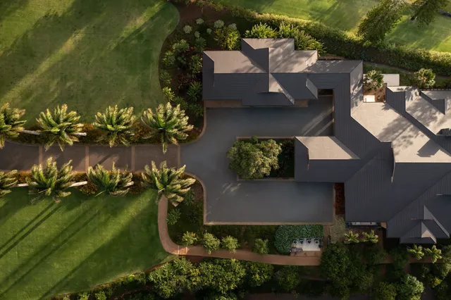 a view of house with swimming pool outdoor seating