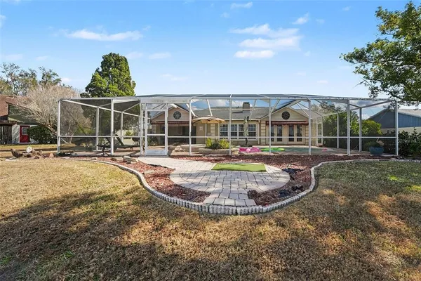 a view of a house with swimming pool