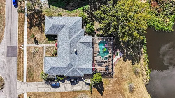 aerial view of a house with table and chairs