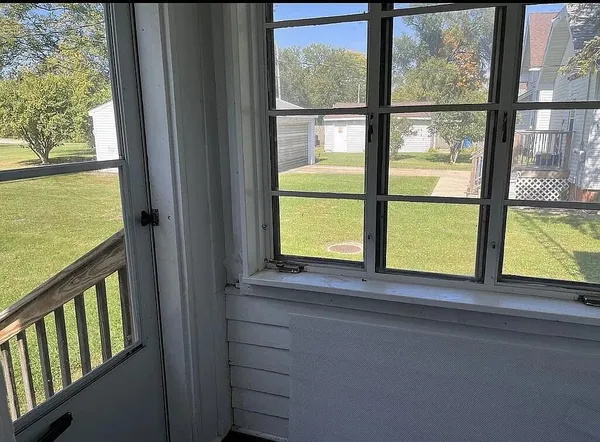 a view of a room with a window