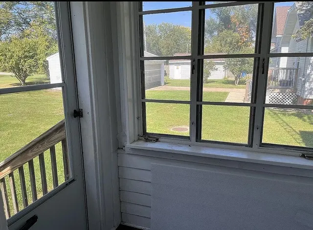a view of a room with a window