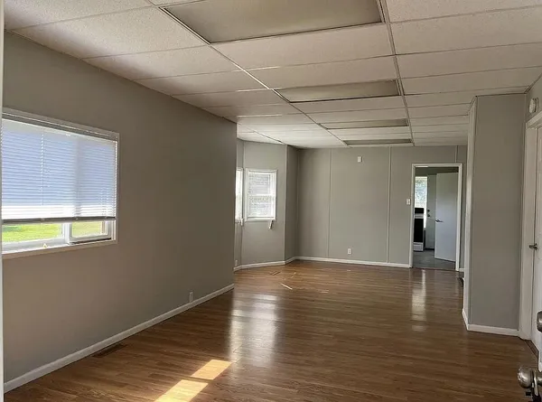 a view of an empty room and window