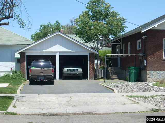 701 Evans Avenue, Unit 2 Reno, NV 89512 - Photo 2 of 4 a front view of a house with a yard