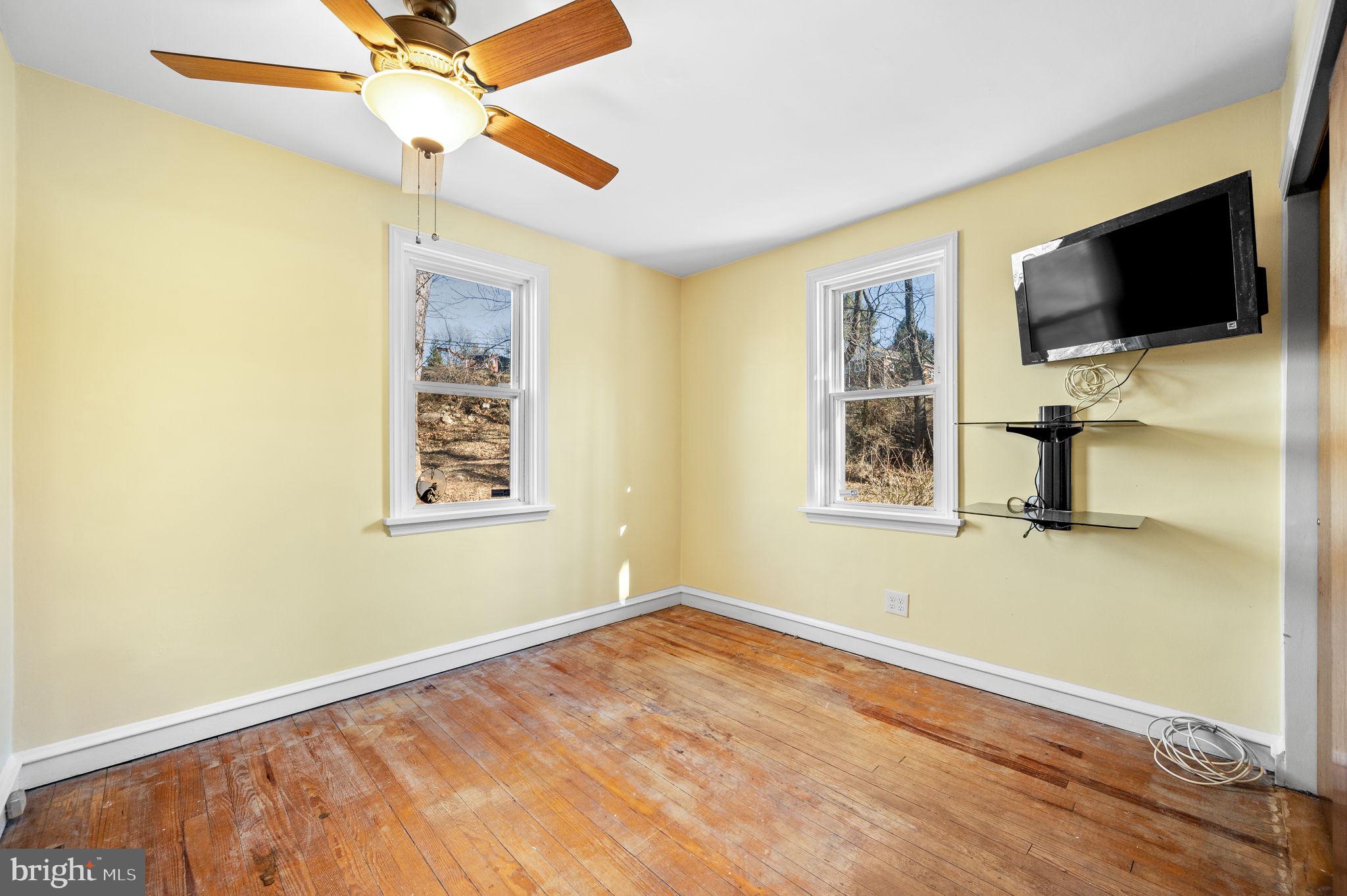 1827 Mill Road Boothwyn, PA 19061 - Photo 9 of 20 Bedroom #2 w/hardwood floors & ceiling fan
