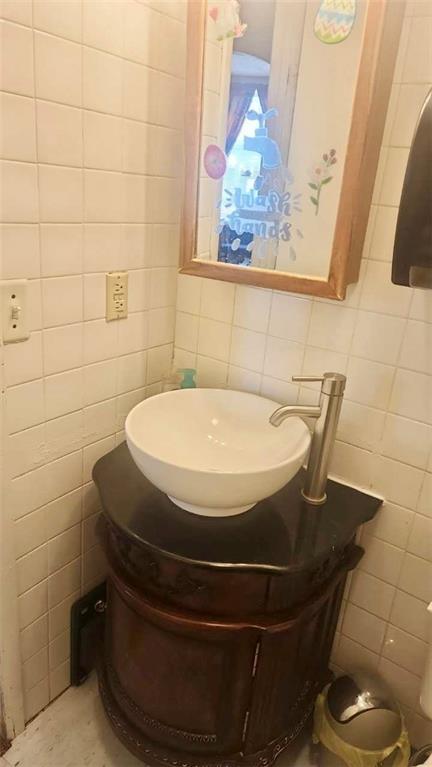 521 West Main Street Rural Valley, PA 16249 - Photo 14 of 39 a bathroom with a sink and a mirror