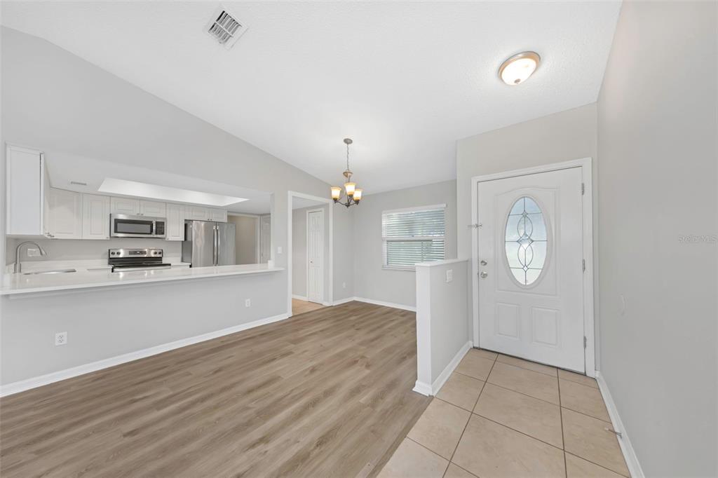 224 Whisper Lake Road Palm Harbor, FL 34683 - Photo 4 of 23 a view of kitchen with sink and refrigerator
