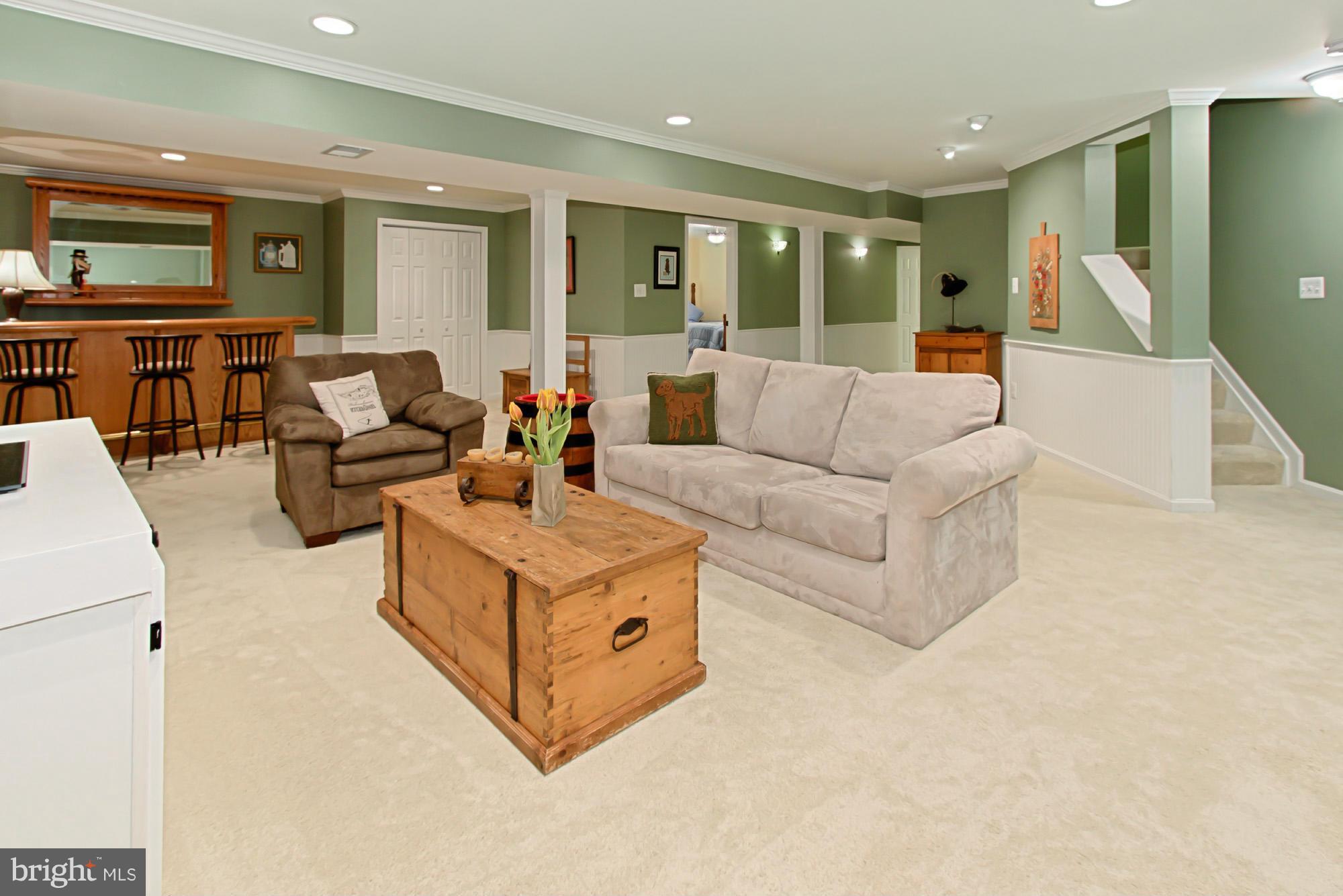 8127 Ridge Creek Way Springfield, VA 22153 - Photo 23 of 30 a living room with furniture and a large window