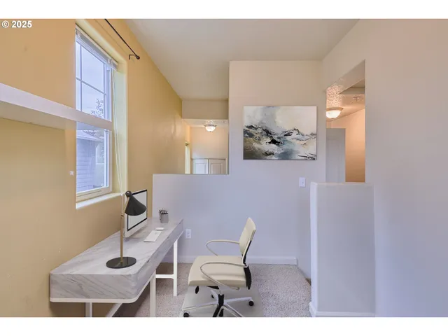 a view of a hallway with entryway