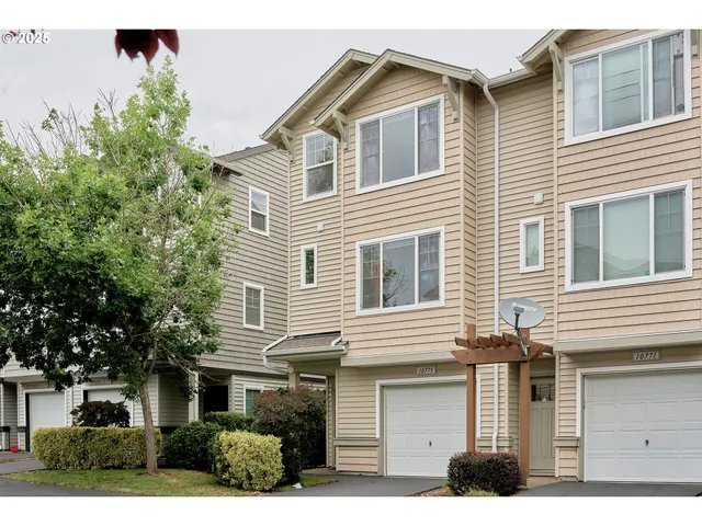 a view of a house with a garage