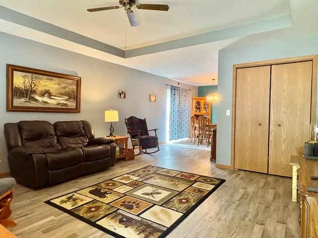 a living room with furniture and a rug